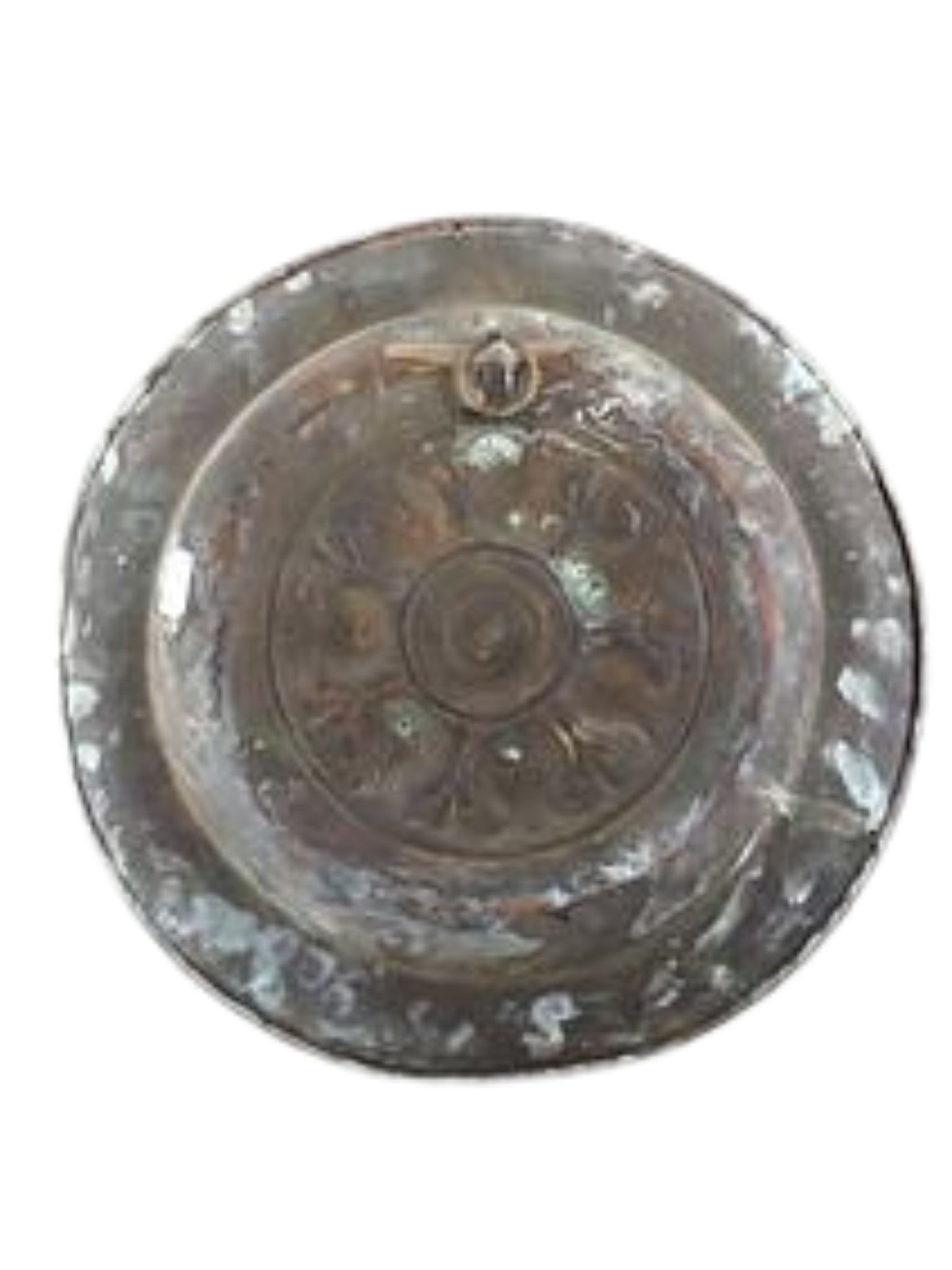 Decorative metal plate with intricate designs on a white background