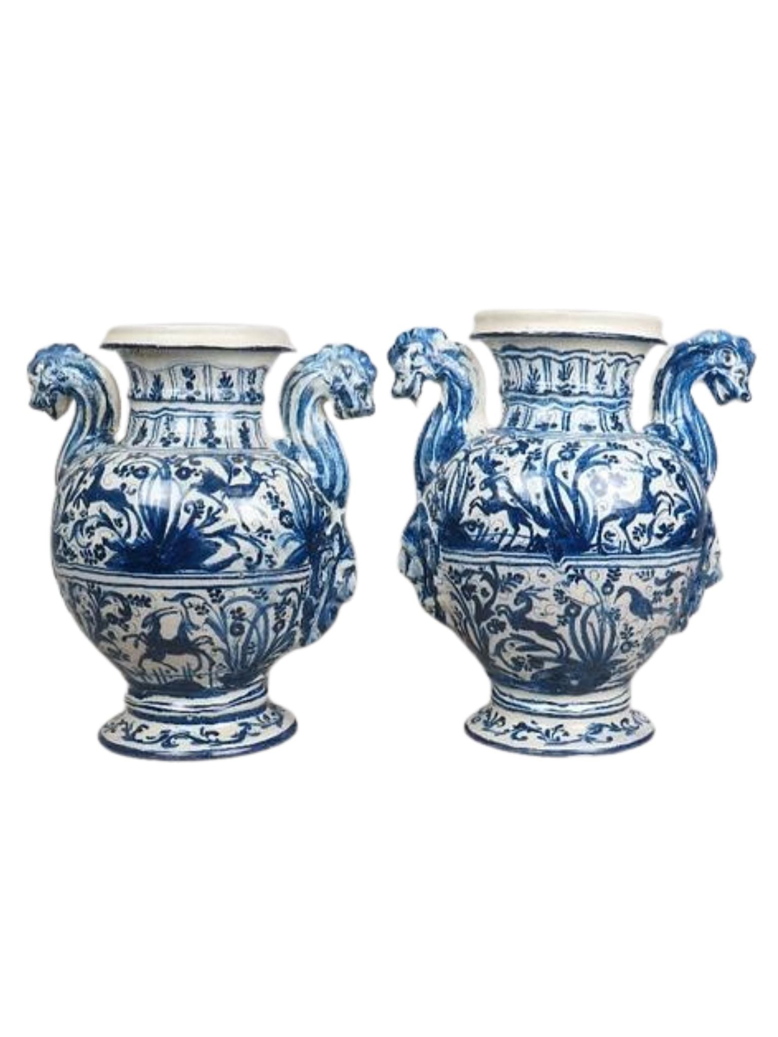 Two blue and white ceramic vases with decorative designs on a white background