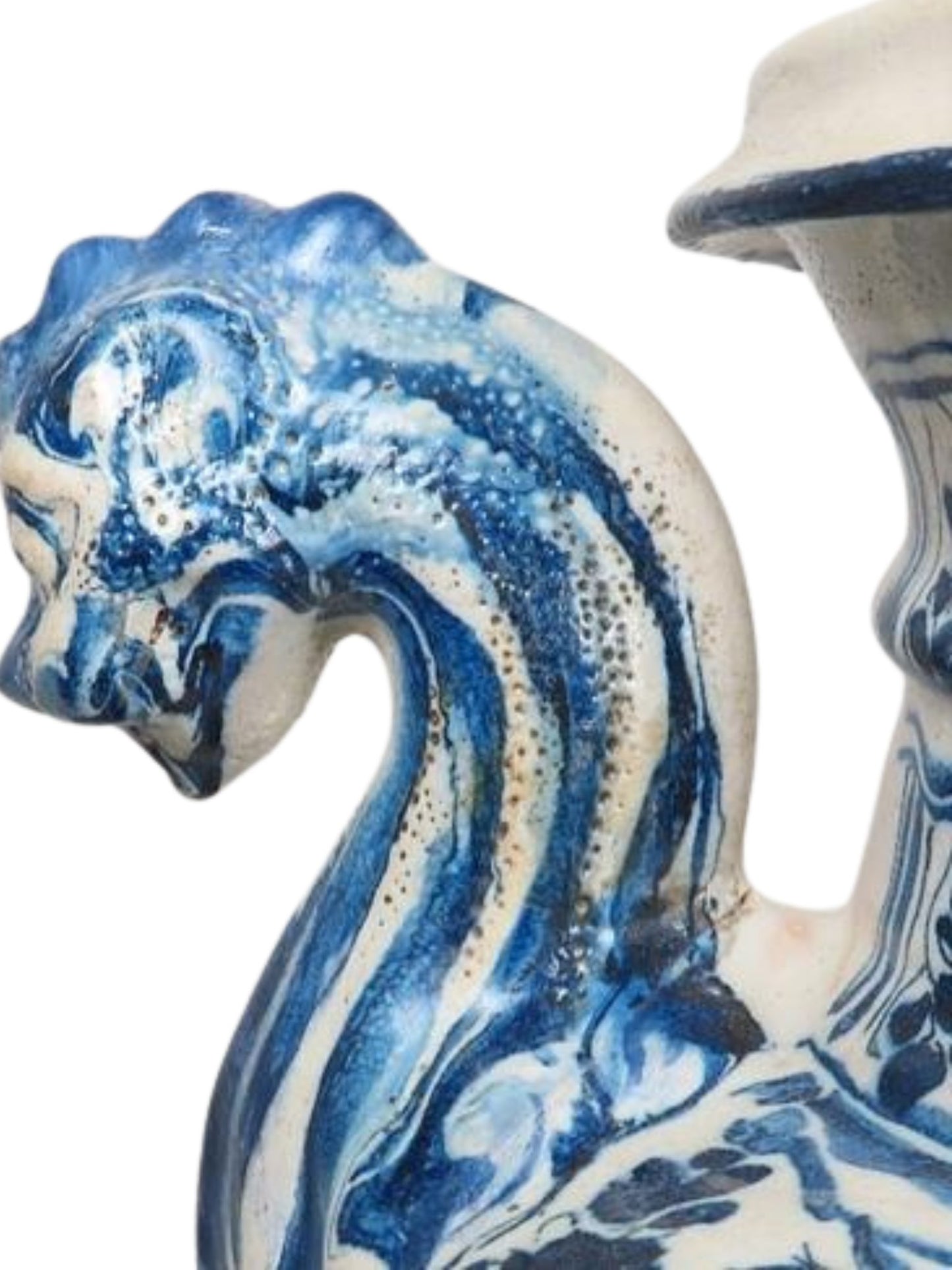 Ceramic rooster with blue and white pattern on a white background