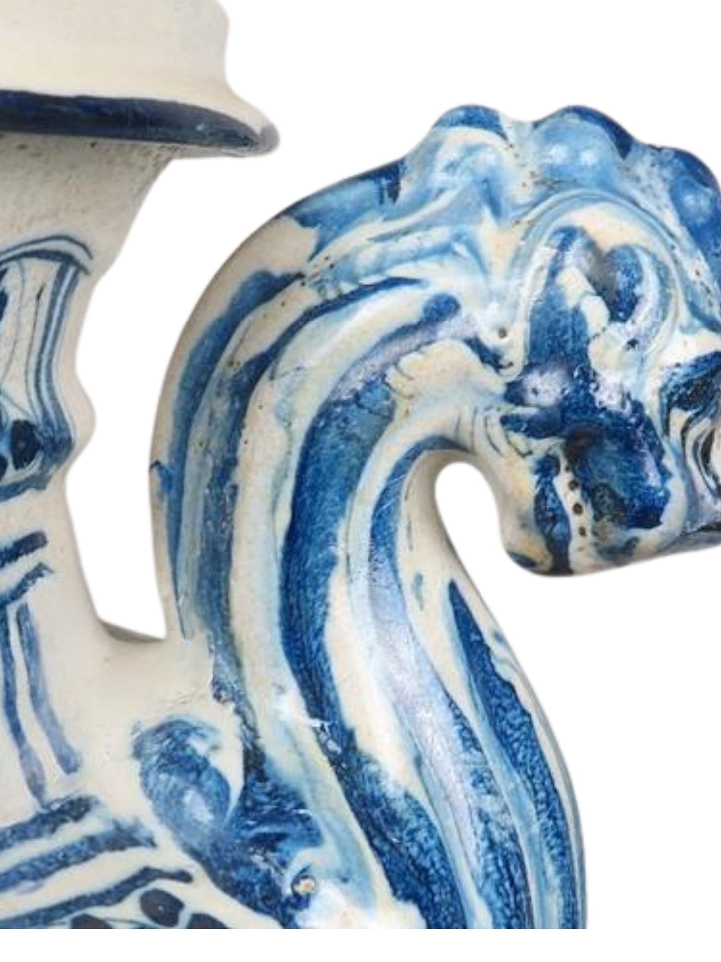 Ceramic horse figurine with blue and white pattern on a white background