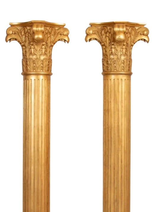 A pair of gilded Corinthian pillars